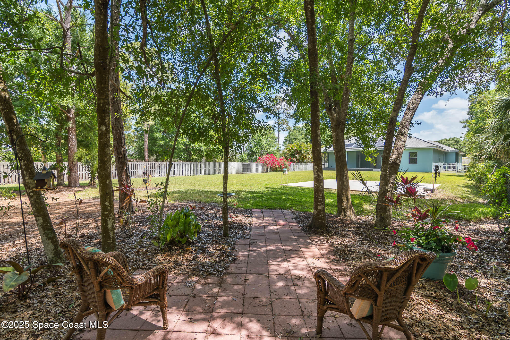 287 Baker Road Melbourne, FL 32934 - Photo 6 of 76 Backyard Seating Area