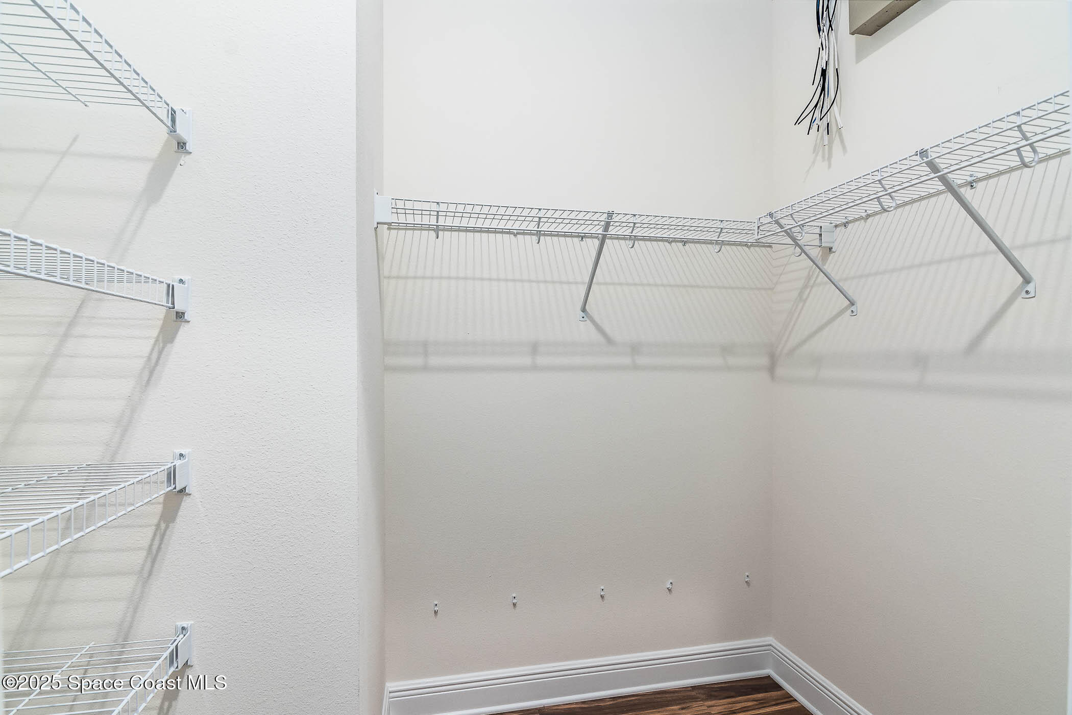 287 Baker Road Melbourne, FL 32934 - Photo 65 of 76 His-and-Hers Closet