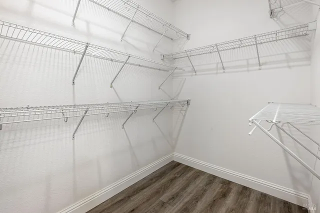 a view of a room with racks on the wall