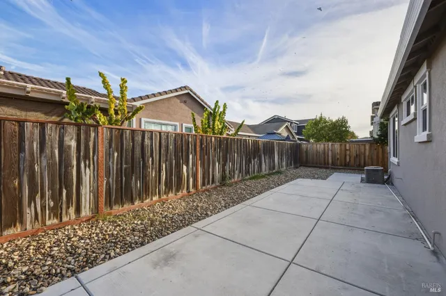 a view of outdoor space with wooden fence