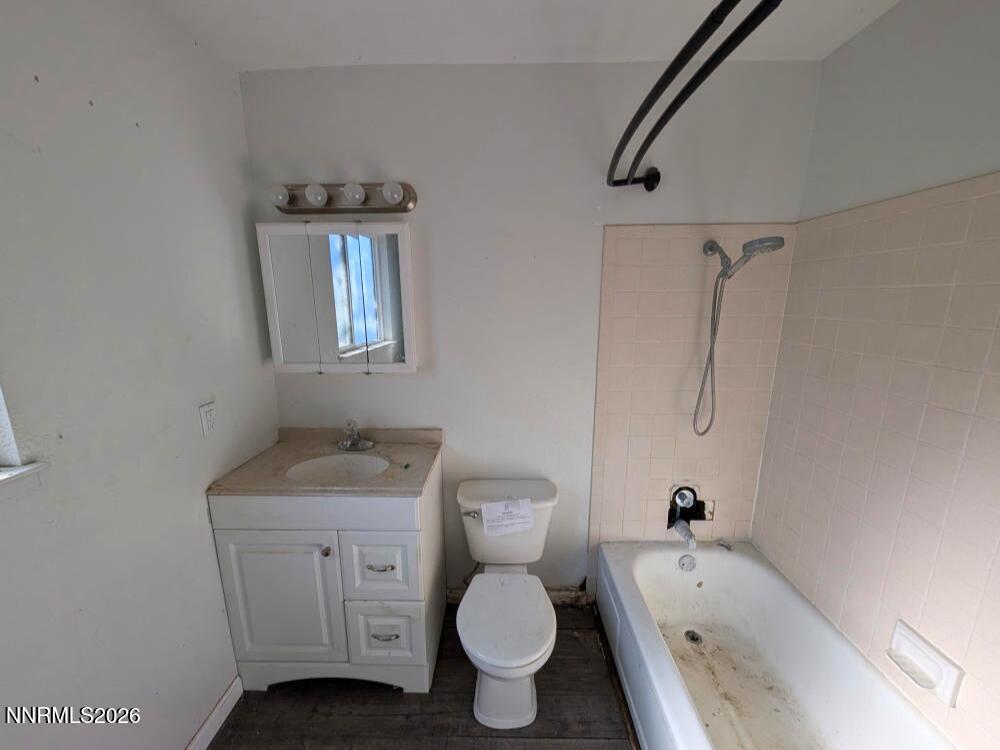 848 C Street Fernley, NV 89408 - Photo 13 of 15 a bathroom with a sink toilet and a bathtub