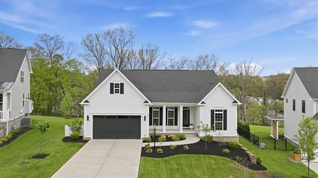 333 Crest Lane Mars, PA 16046 - Photo 1 of 32 a front view of a house with garden