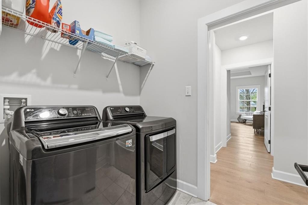 333 Crest Lane Mars, PA 16046 - Photo 21 of 32 a kitchen with a stove and a wooden floor