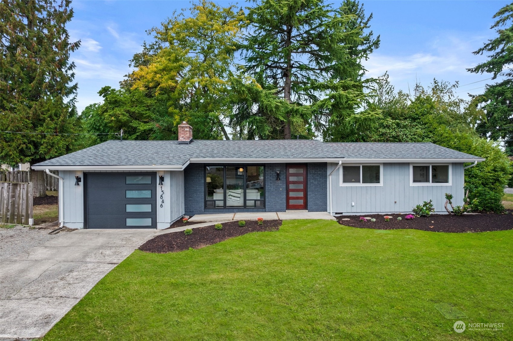 15846 Southeast 132nd Place Renton, WA 98059 - Photo 1 of 37 a front view of house with yard and green space