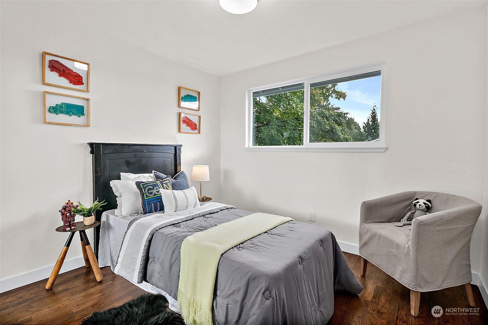 15846 Southeast 132nd Place Renton, WA 98059 - Photo 32 of 37 a bedroom with a bed and a window