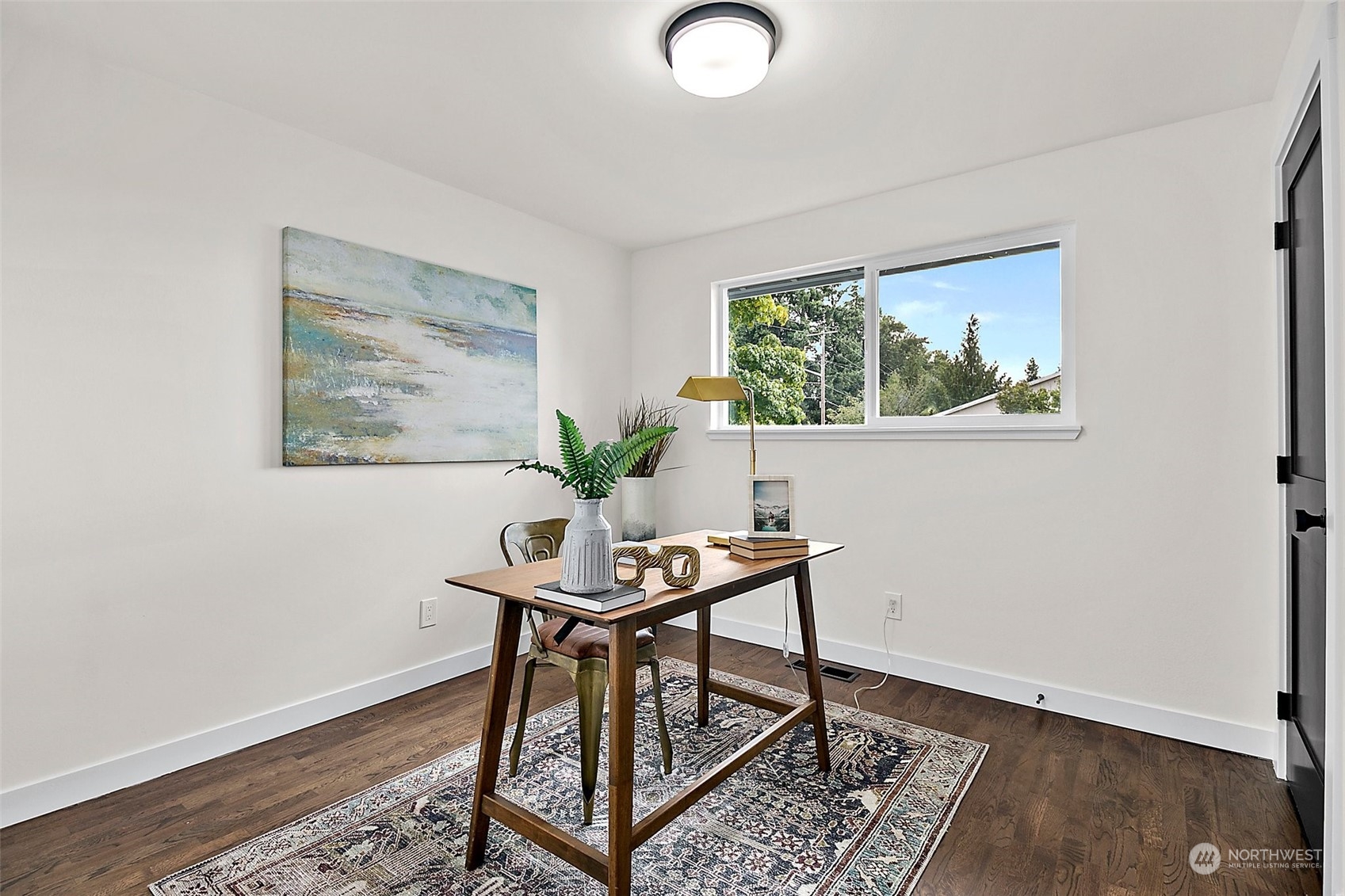 15846 Southeast 132nd Place Renton, WA 98059 - Photo 33 of 37 a view of a workspace room with furniture and wooden floor