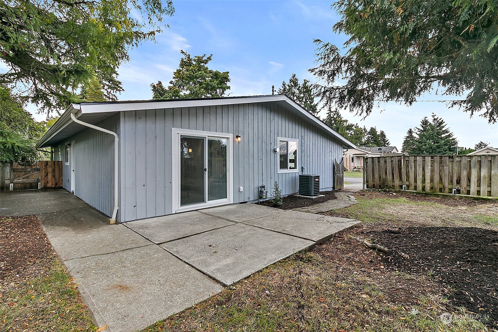 15846 Southeast 132nd Place Renton, WA 98059 - Photo 5 of 37 a view of a house with a yard
