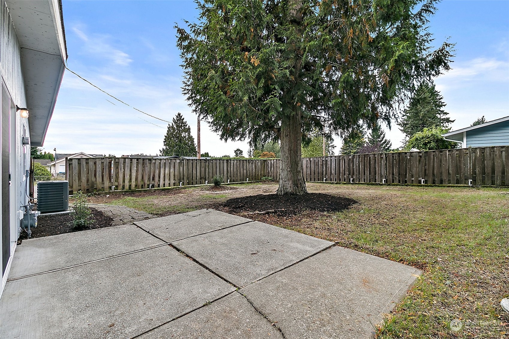 15846 Southeast 132nd Place Renton, WA 98059 - Photo 8 of 37 a view of street with wooden fence