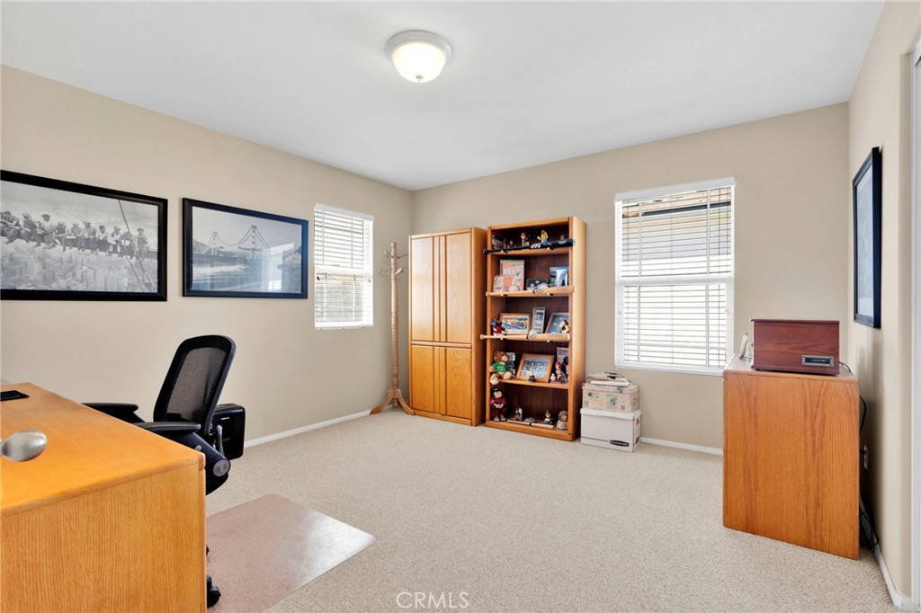 13798 Misty Path Victorville, CA 92392 - Photo 32 of 55 a view of workspace with furniture and window
