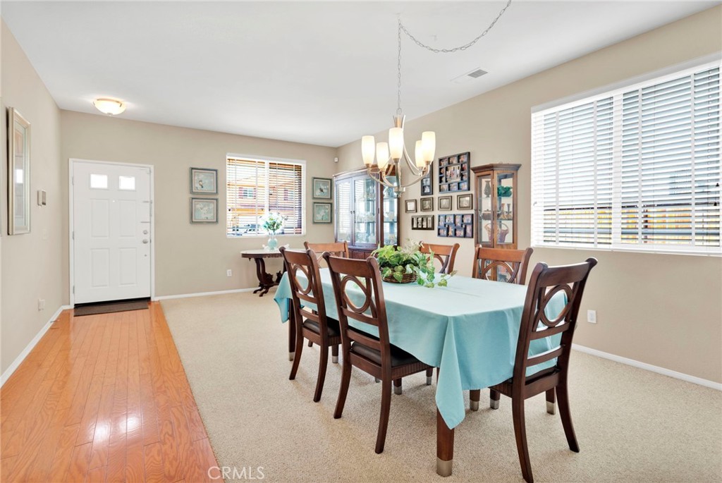13798 Misty Path Victorville, CA 92392 - Photo 4 of 55 a view of a dining room with furniture window and outside view