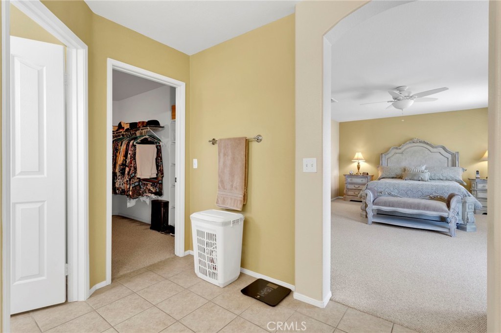 13798 Misty Path Victorville, CA 92392 - Photo 45 of 55 a en suite bathroom with a tub and shower