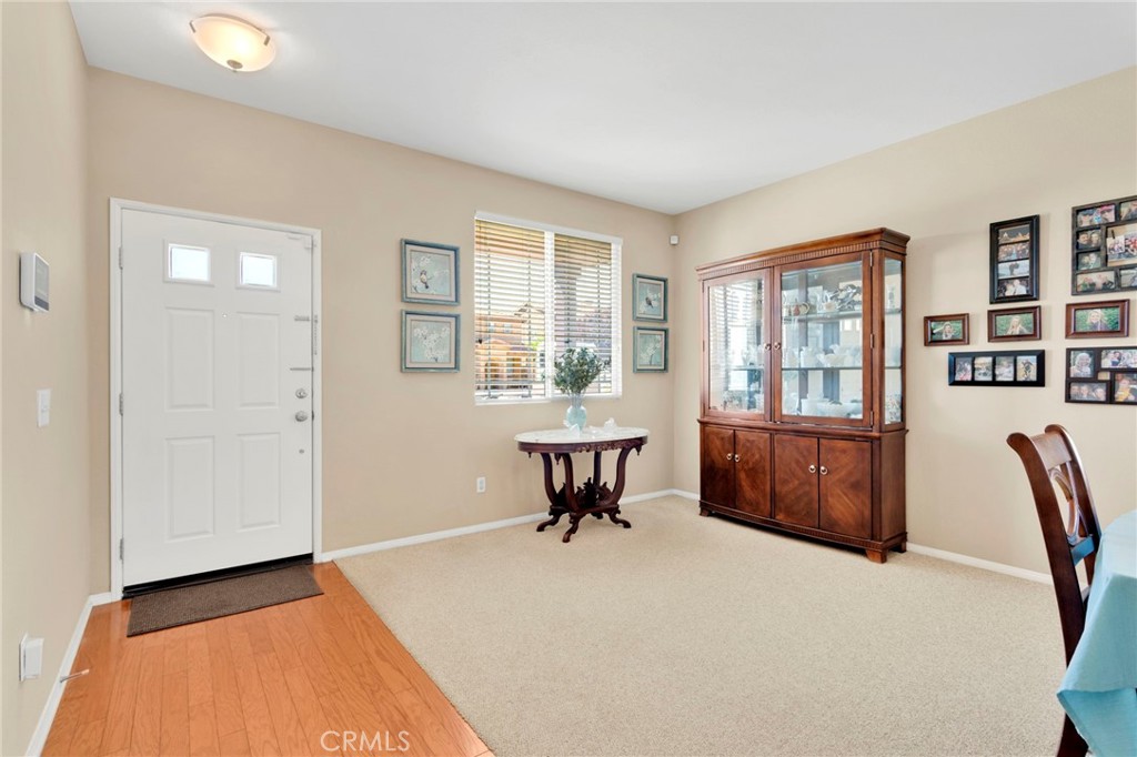 13798 Misty Path Victorville, CA 92392 - Photo 5 of 55 a living room with furniture and a window