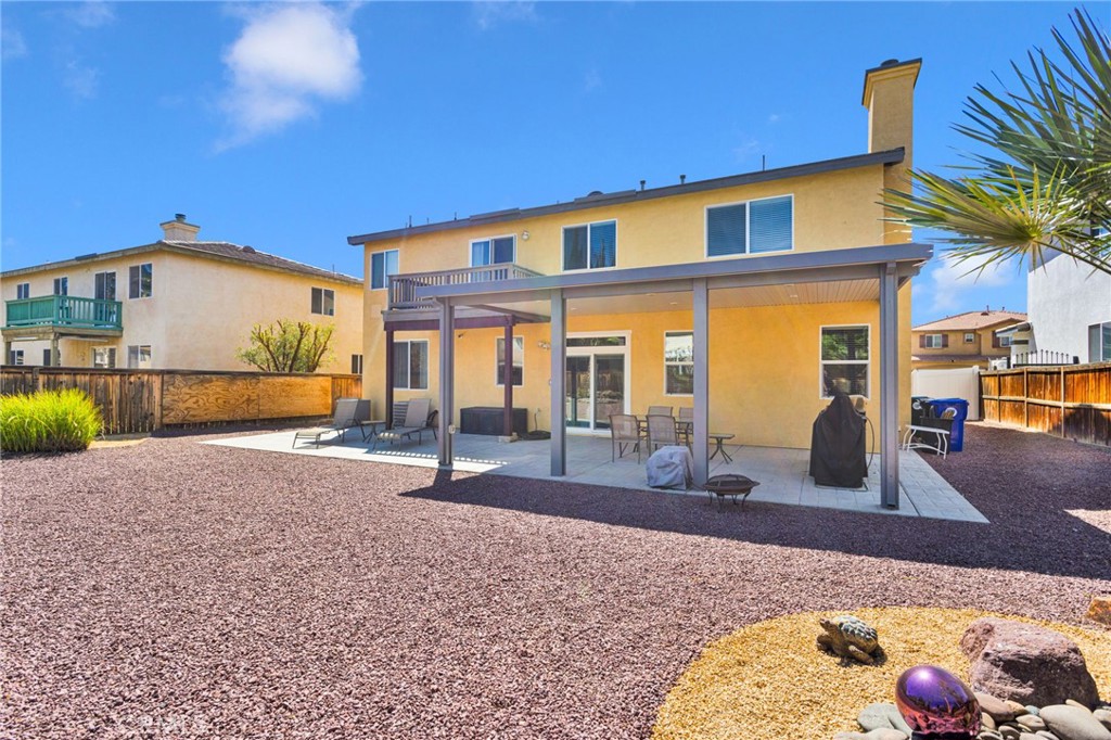 13798 Misty Path Victorville, CA 92392 - Photo 54 of 55 a front view of a house with basket ball court
