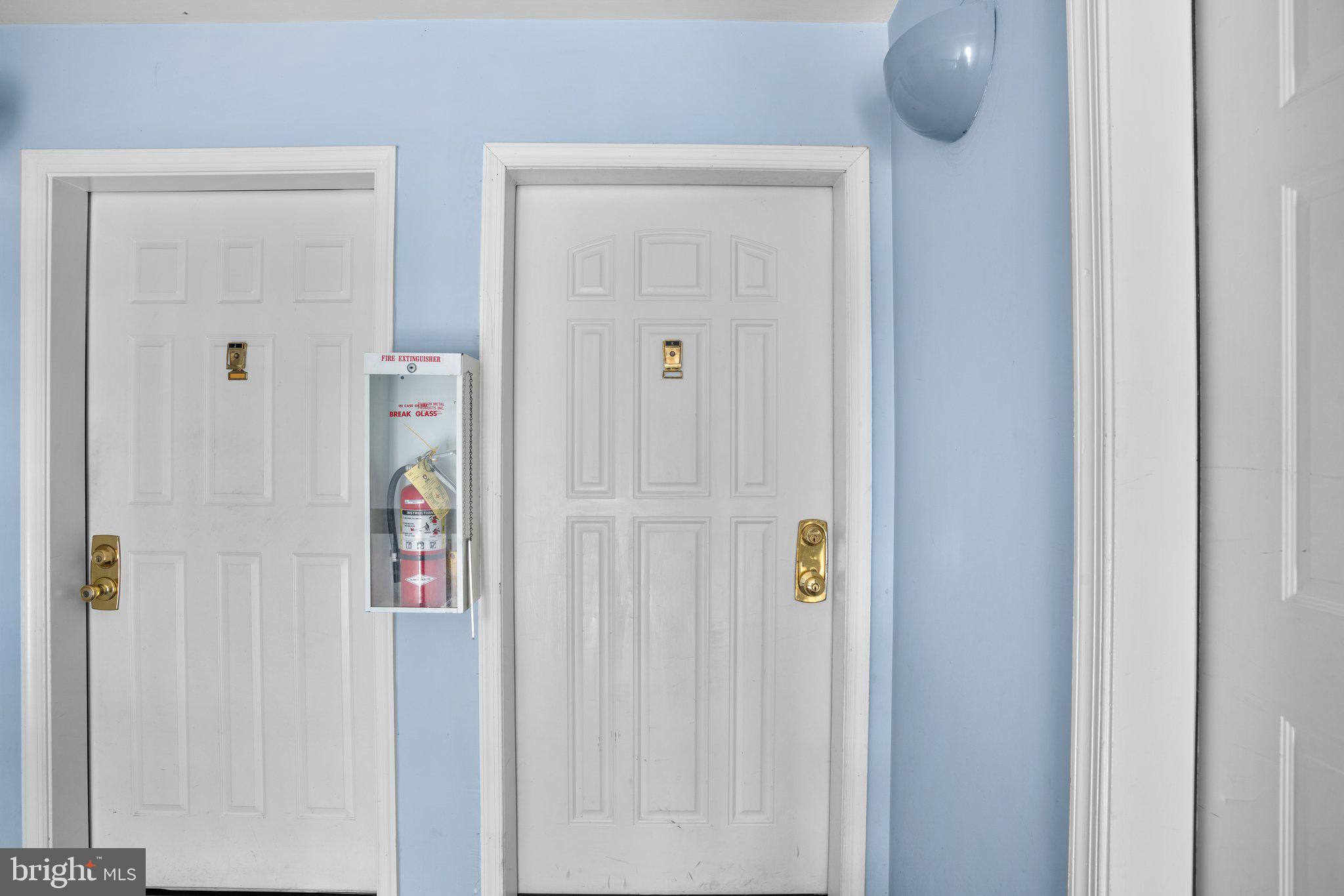 8335 Montgomery Run Road, Unit K Ellicott City, MD 21043 - Photo 3 of 42 a door with a shower