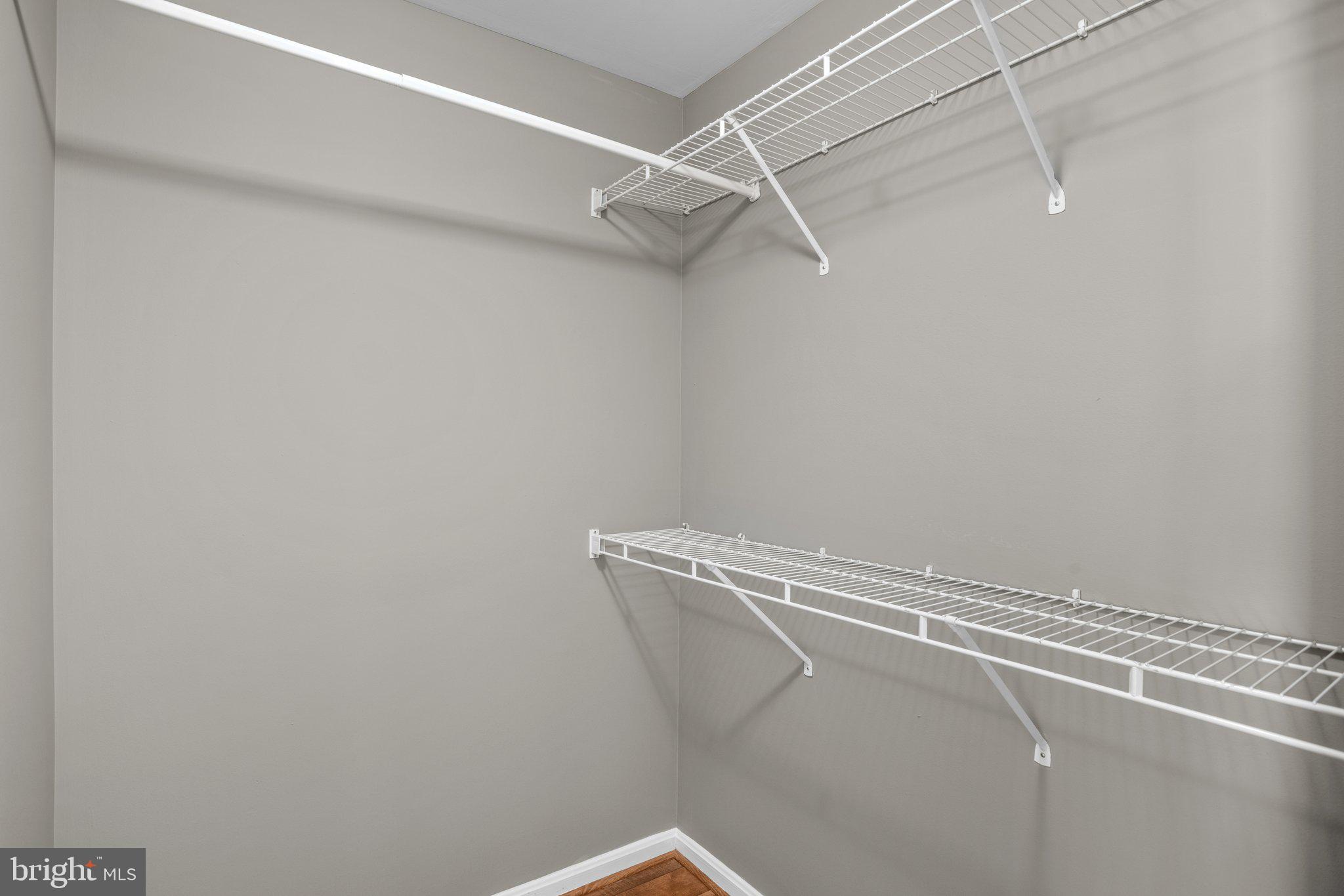8335 Montgomery Run Road, Unit K Ellicott City, MD 21043 - Photo 31 of 42 a view of a room with racks on the wall