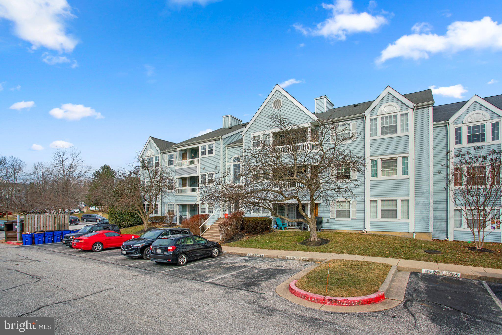 8335 Montgomery Run Road, Unit K Ellicott City, MD 21043 - Photo 42 of 42 a view of multiple houses with a patio