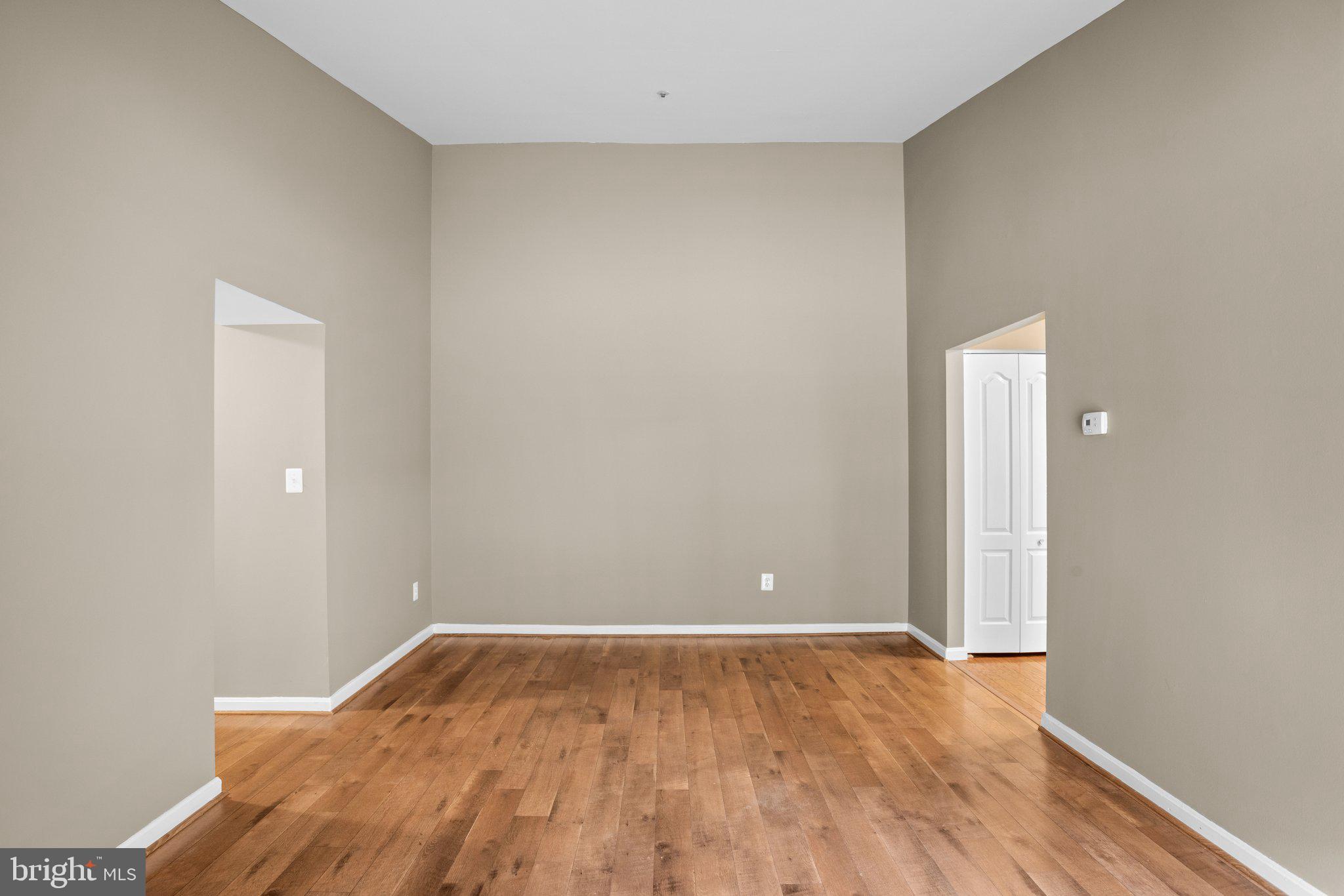 8335 Montgomery Run Road, Unit K Ellicott City, MD 21043 - Photo 8 of 42 a view of room with wooden floor