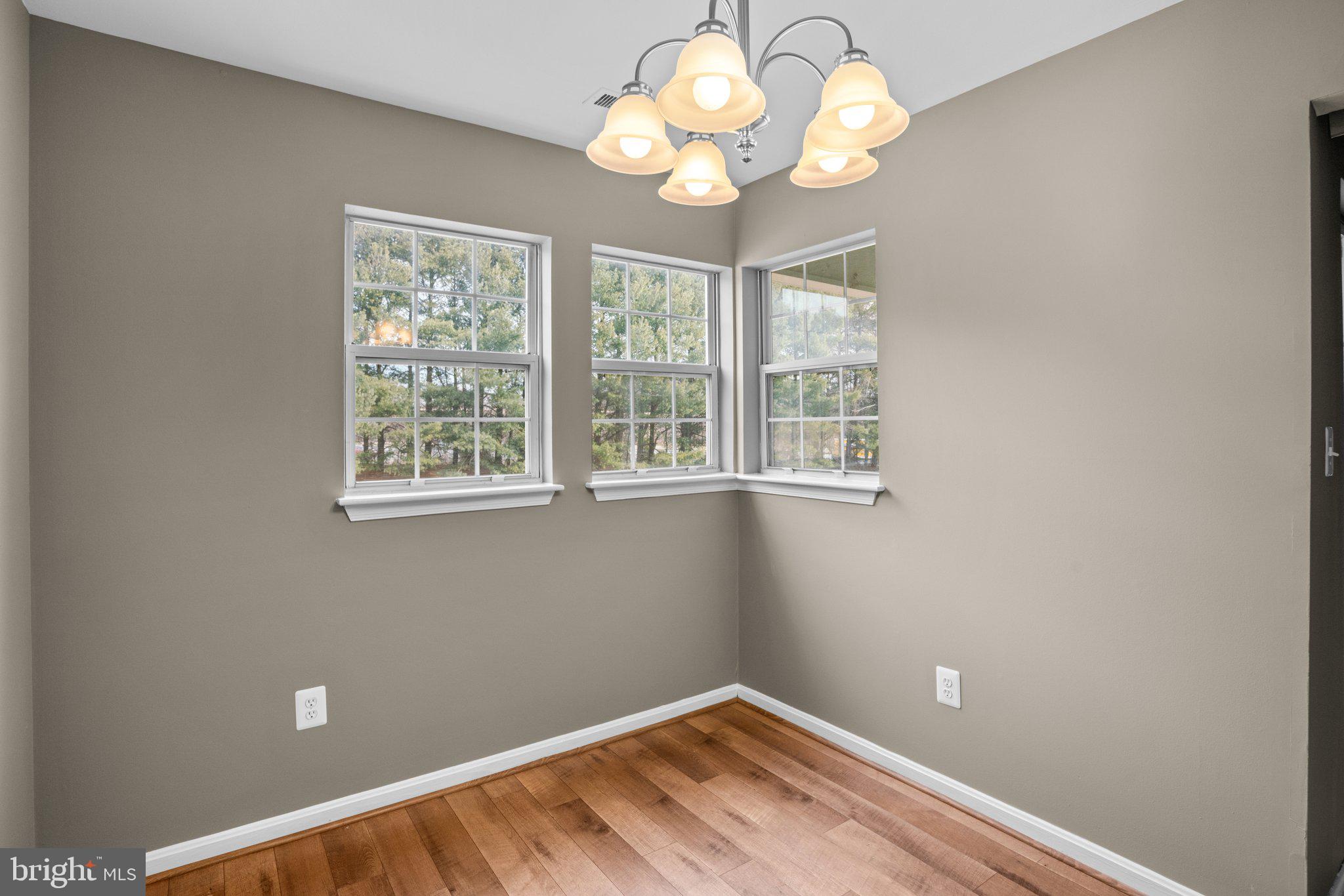 8335 Montgomery Run Road, Unit K Ellicott City, MD 21043 - Photo 10 of 42 a view of room with window and ceiling fan
