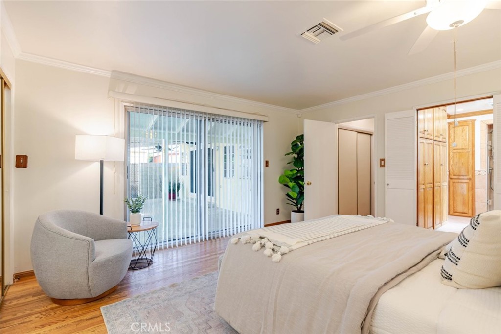 835 North Lincoln Street Burbank, CA 91506 - Photo 11 of 38 a bedroom with a bed and a couch