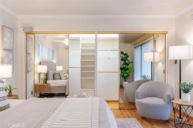 a spacious bathroom with a granite countertop sink mirror and a shower