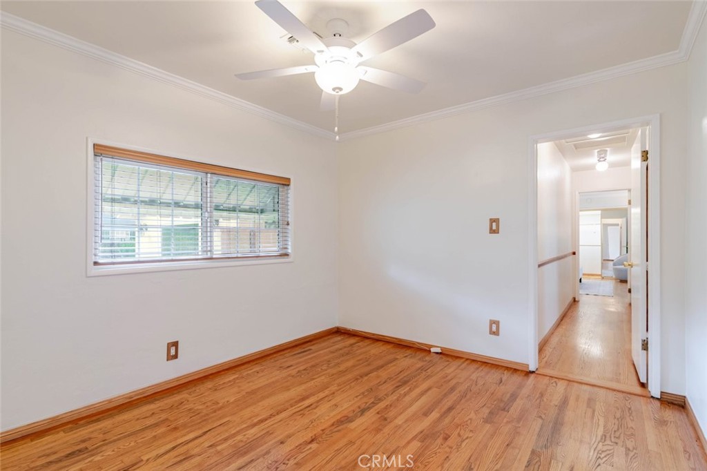 835 North Lincoln Street Burbank, CA 91506 - Photo 17 of 38 a view of empty room with wooden floor and fan