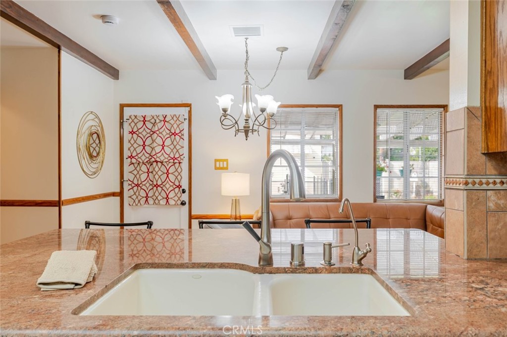 835 North Lincoln Street Burbank, CA 91506 - Photo 24 of 38 a view of a living room and chandelier