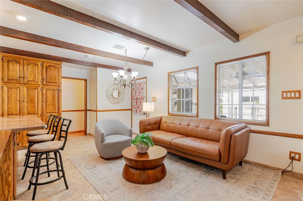 835 North Lincoln Street Burbank, CA 91506 - Photo 28 of 38 a living room with furniture and a large window