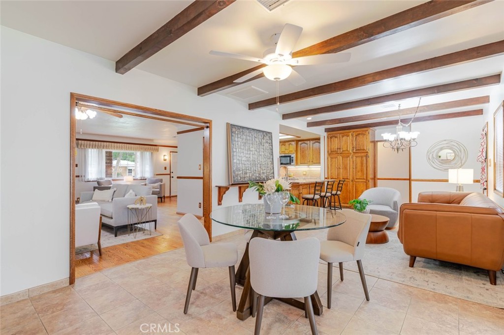 835 North Lincoln Street Burbank, CA 91506 - Photo 31 of 38 a dining room with furniture and a large window
