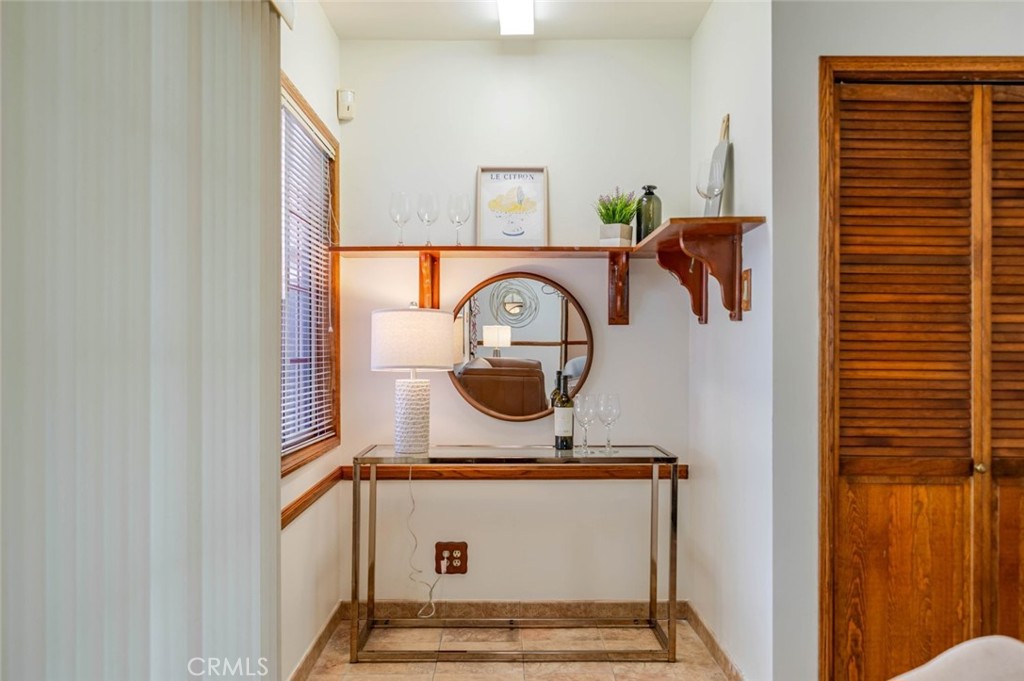 835 North Lincoln Street Burbank, CA 91506 - Photo 32 of 38 a bathroom with a sink and a mirror