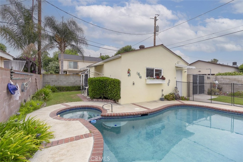 835 North Lincoln Street Burbank, CA 91506 - Photo 37 of 38 a view of swimming pool with a patio