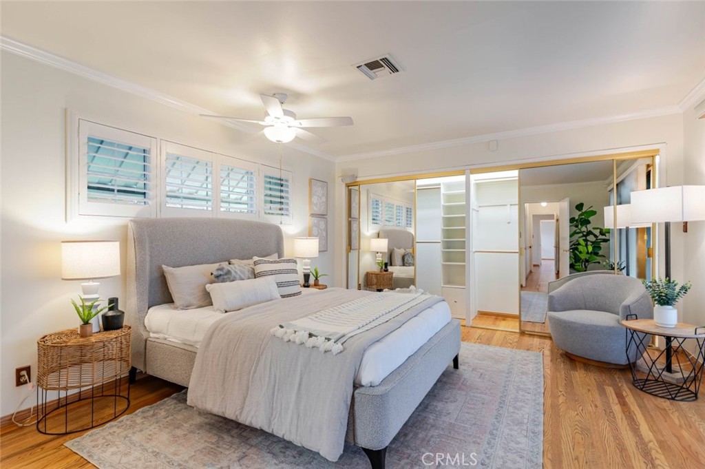 835 North Lincoln Street Burbank, CA 91506 - Photo 9 of 38 a bedroom with a bed and a couch