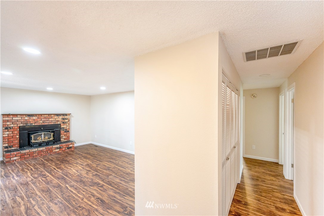 6891 Old Guide Road Lynden, WA 98264 - Photo 17 of 32 a view of an empty room and fire place