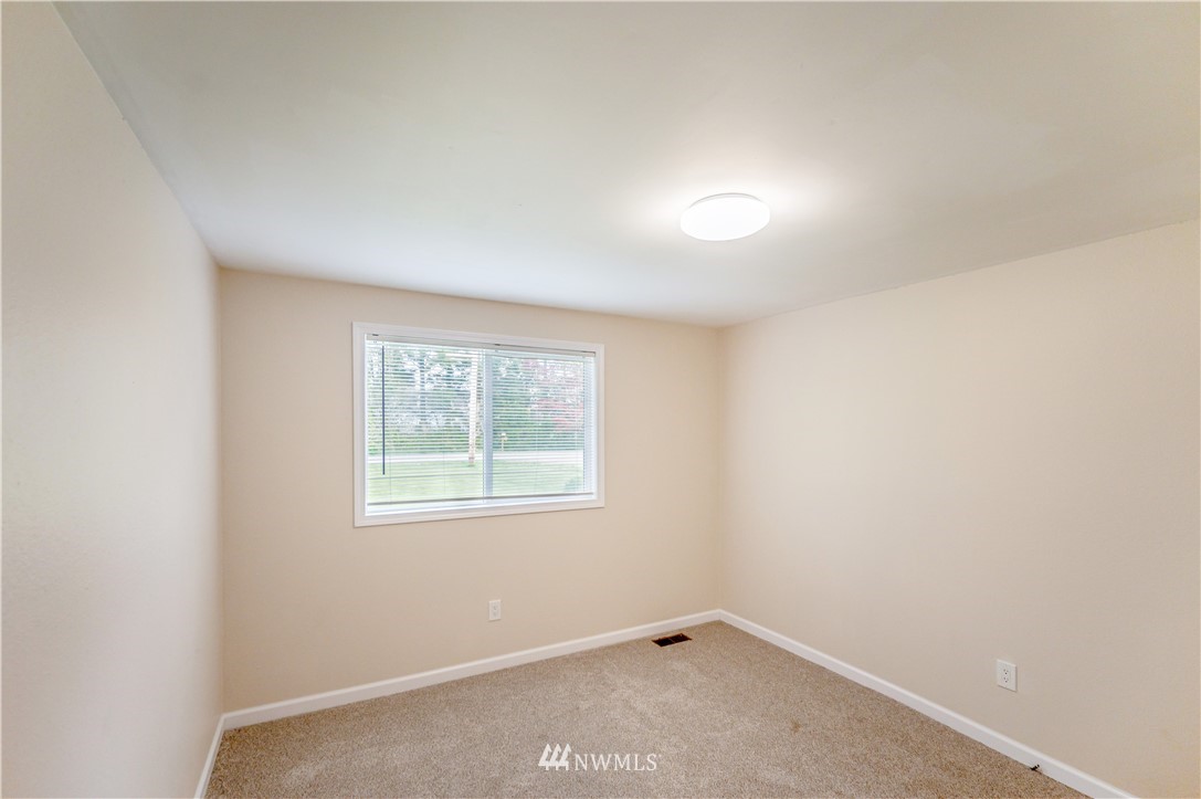 6891 Old Guide Road Lynden, WA 98264 - Photo 20 of 32 an empty room with a window