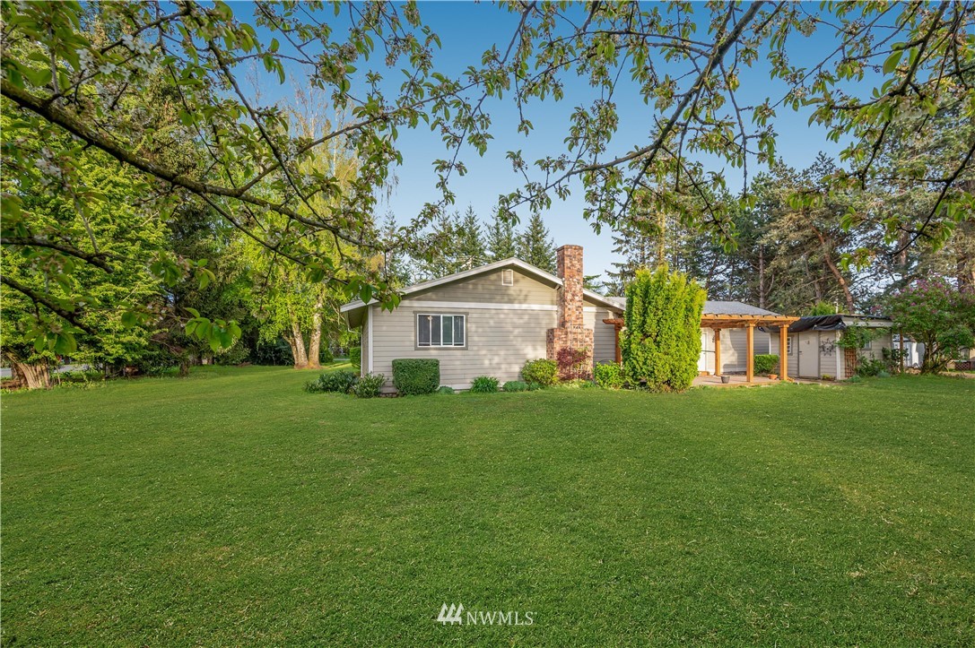 6891 Old Guide Road Lynden, WA 98264 - Photo 27 of 32 a house view with a garden space