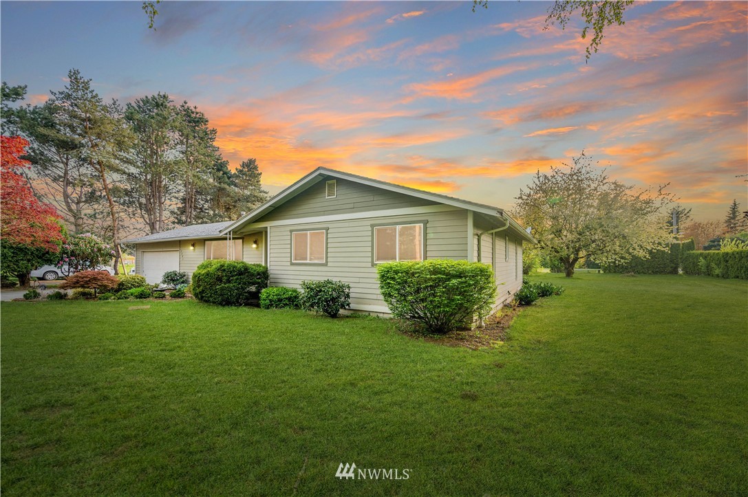 6891 Old Guide Road Lynden, WA 98264 - Photo 4 of 32 a view of an house with backyard space and garden