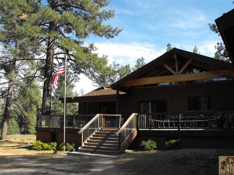 59320 Devils Ladder Road Mountain Center, CA 92561 - Photo 4 of 19 a front view of a house with garden