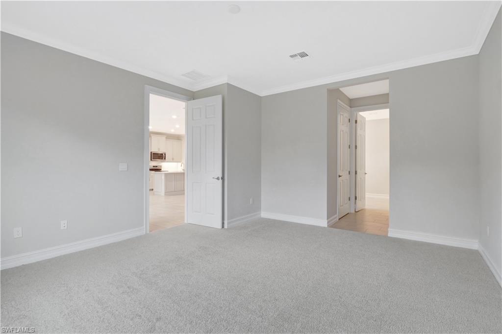 335 Tamarindo Lane Naples, FL 34114 - Photo 12 of 38 a view of empty room