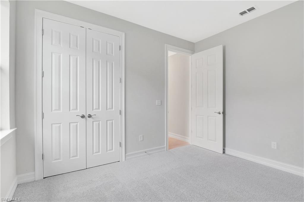 335 Tamarindo Lane Naples, FL 34114 - Photo 19 of 38 a view of an empty room