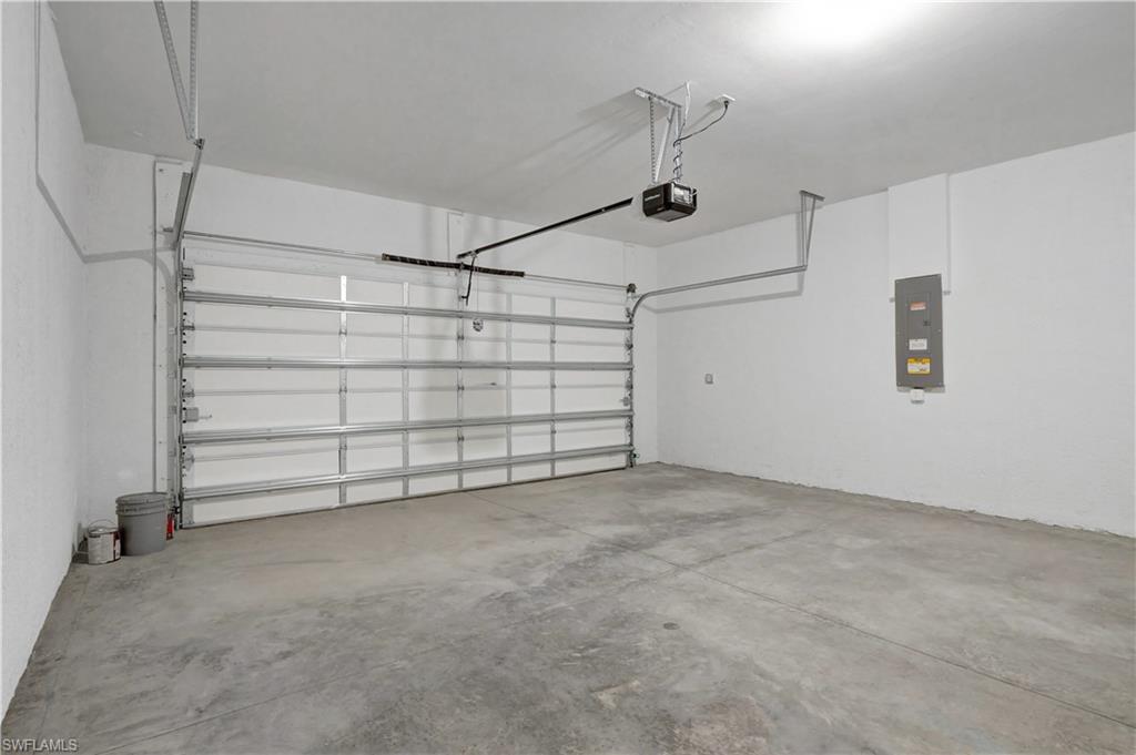 335 Tamarindo Lane Naples, FL 34114 - Photo 31 of 38 a view of a garage room