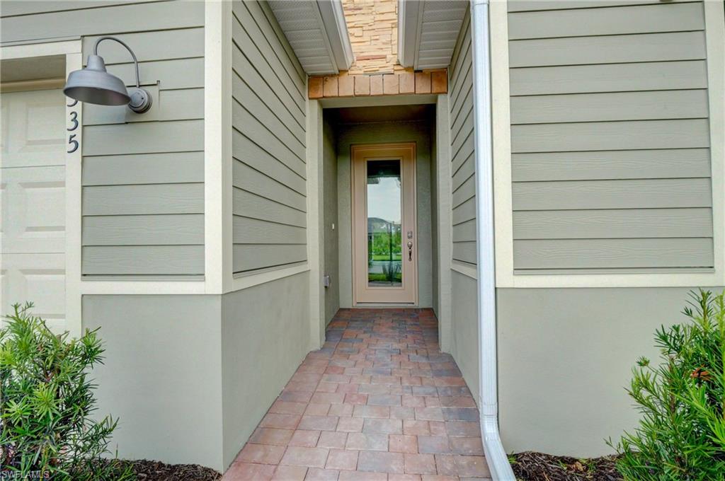 335 Tamarindo Lane Naples, FL 34114 - Photo 4 of 38 a view of a door and an entryway door