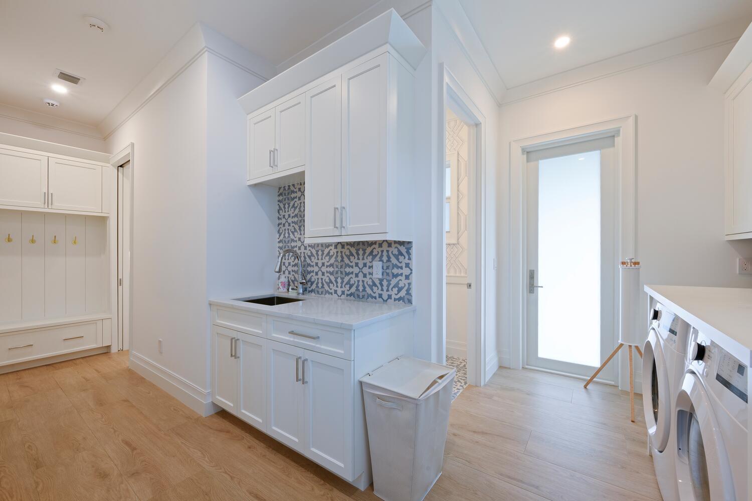 643 Pilot Road North Palm Beach, FL 33408 - Photo 23 of 73 LAUNDRY1ST FLOOR / POWDER ROOM