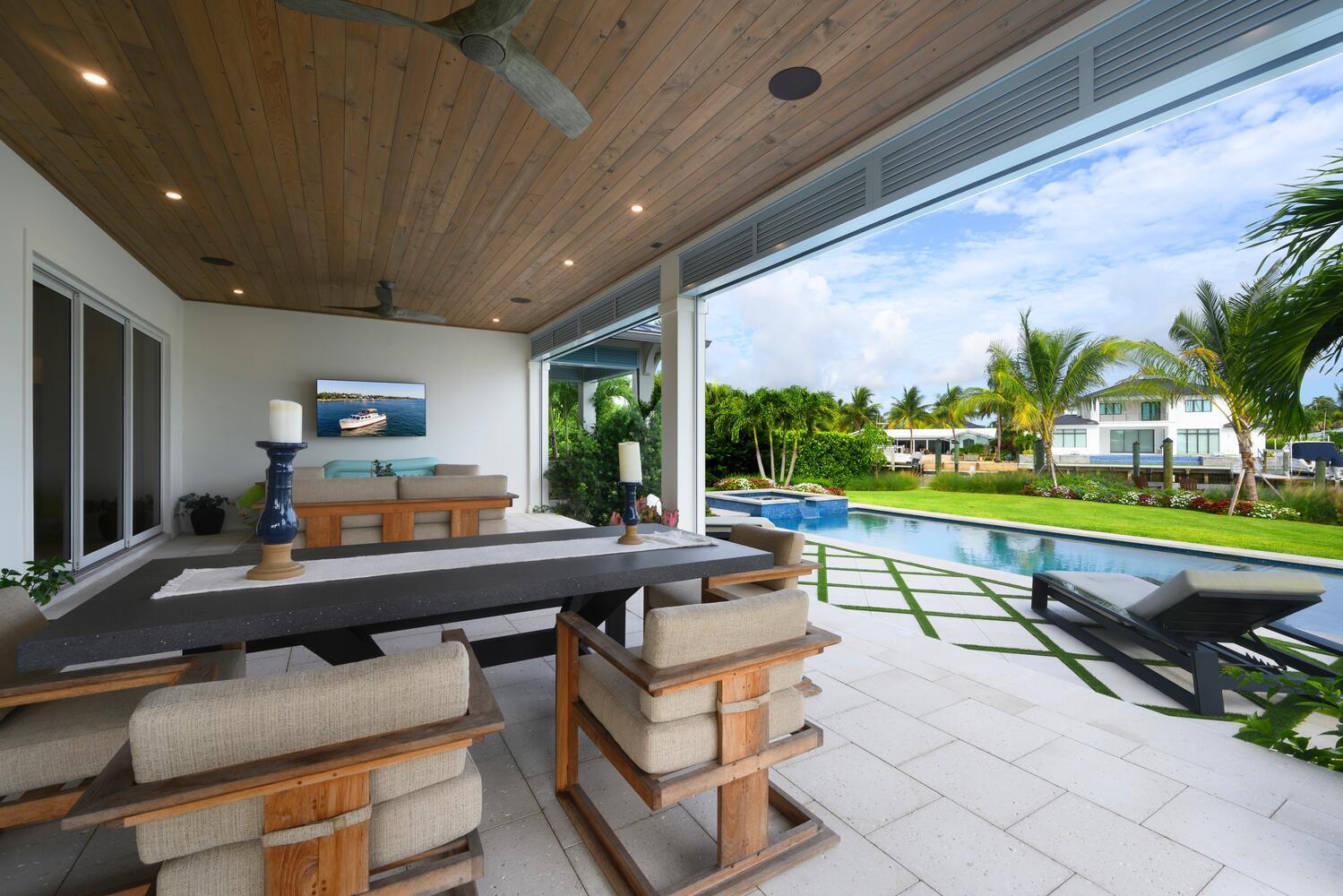 643 Pilot Road North Palm Beach, FL 33408 - Photo 42 of 73 a outdoor space with chairs and pool table