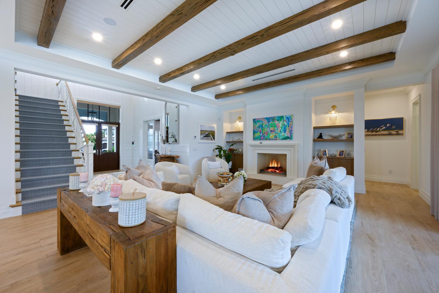 643 Pilot Road North Palm Beach, FL 33408 - Photo 6 of 73 a living room with furniture and a fireplace