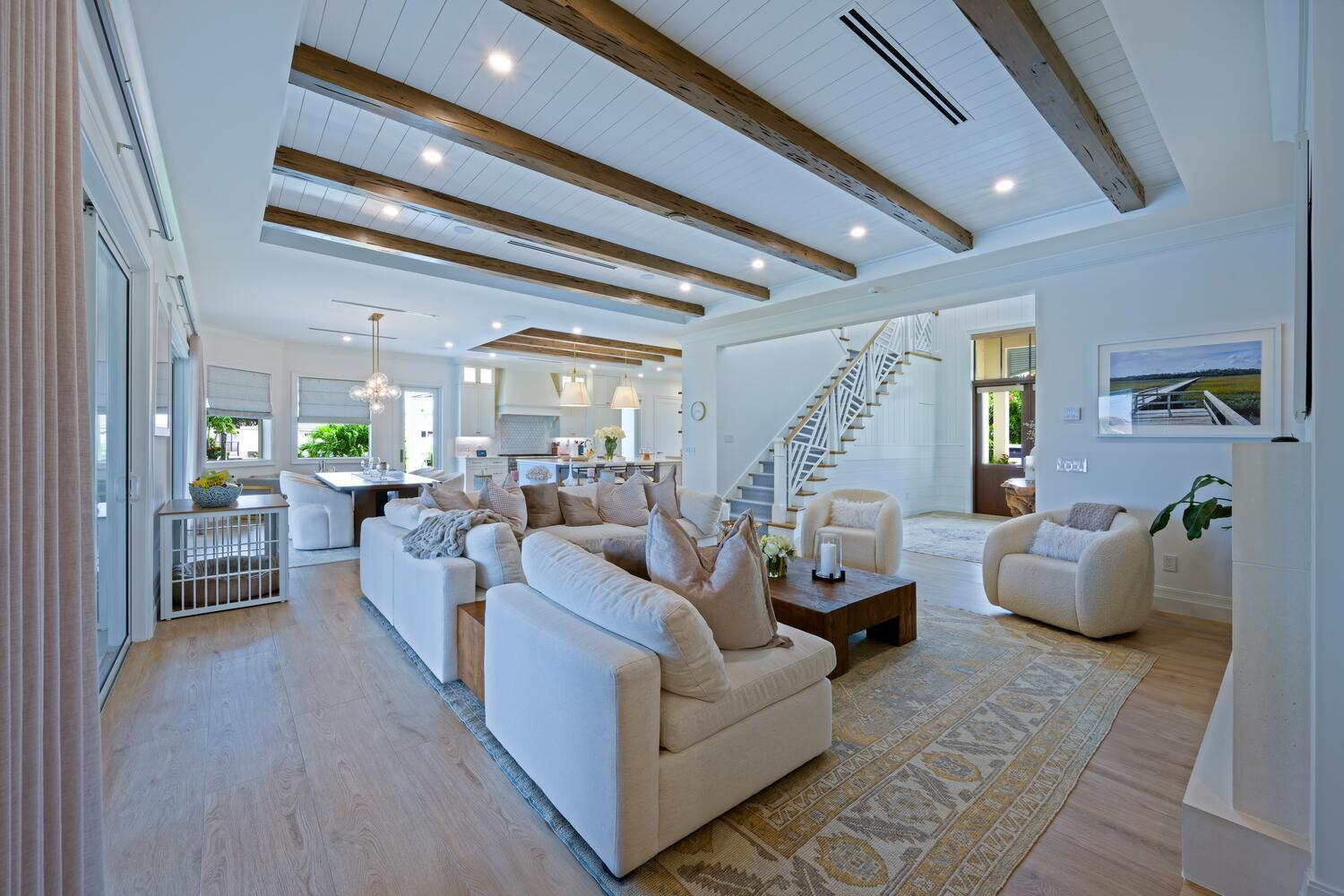 643 Pilot Road North Palm Beach, FL 33408 - Photo 7 of 73 a living room with furniture and a chandelier