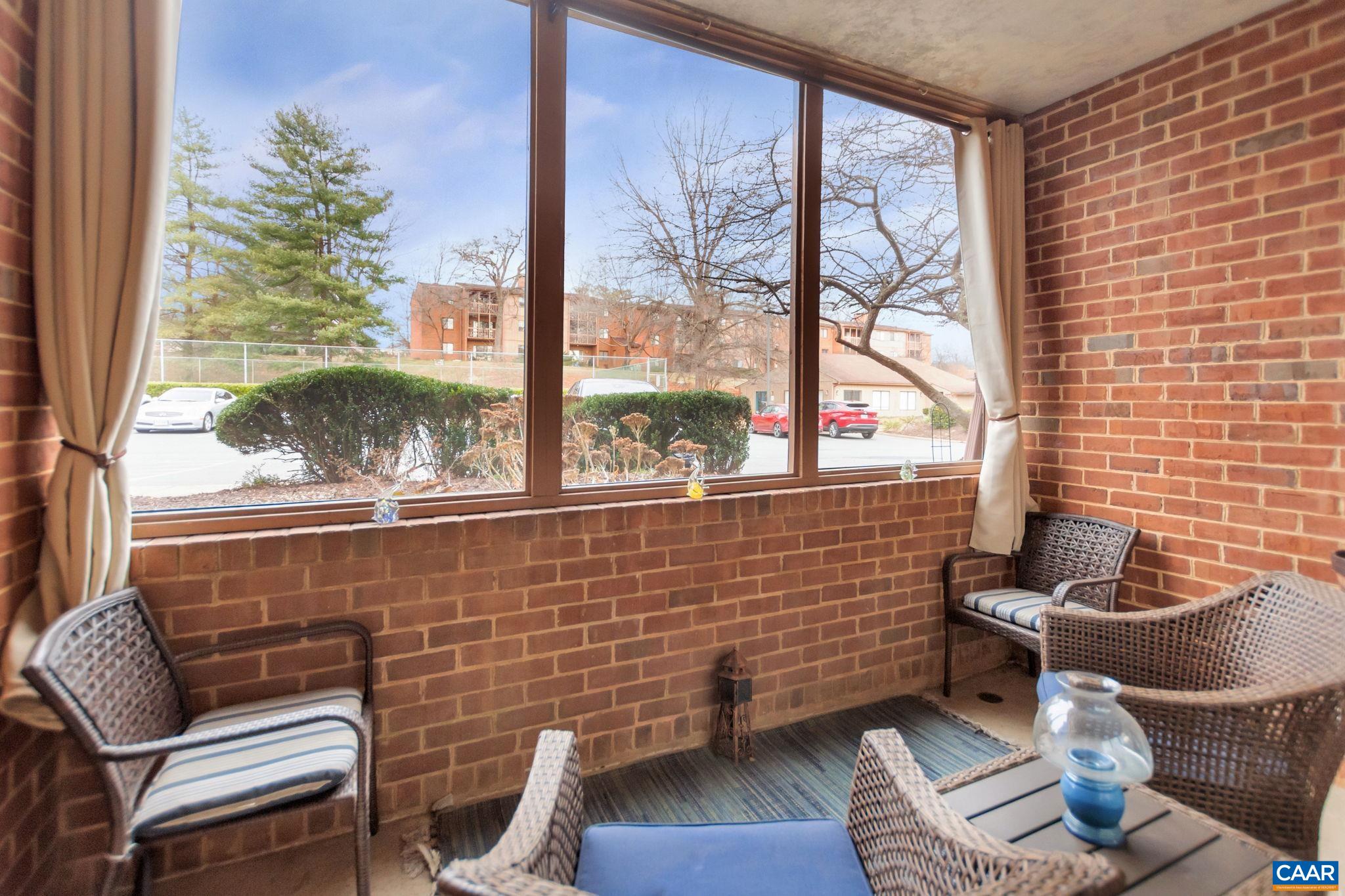 114 Turtle Creek Road, Unit 1 Charlottesville, VA 22901 - Photo 4 of 24 a view of a outdoor seating area with furniture