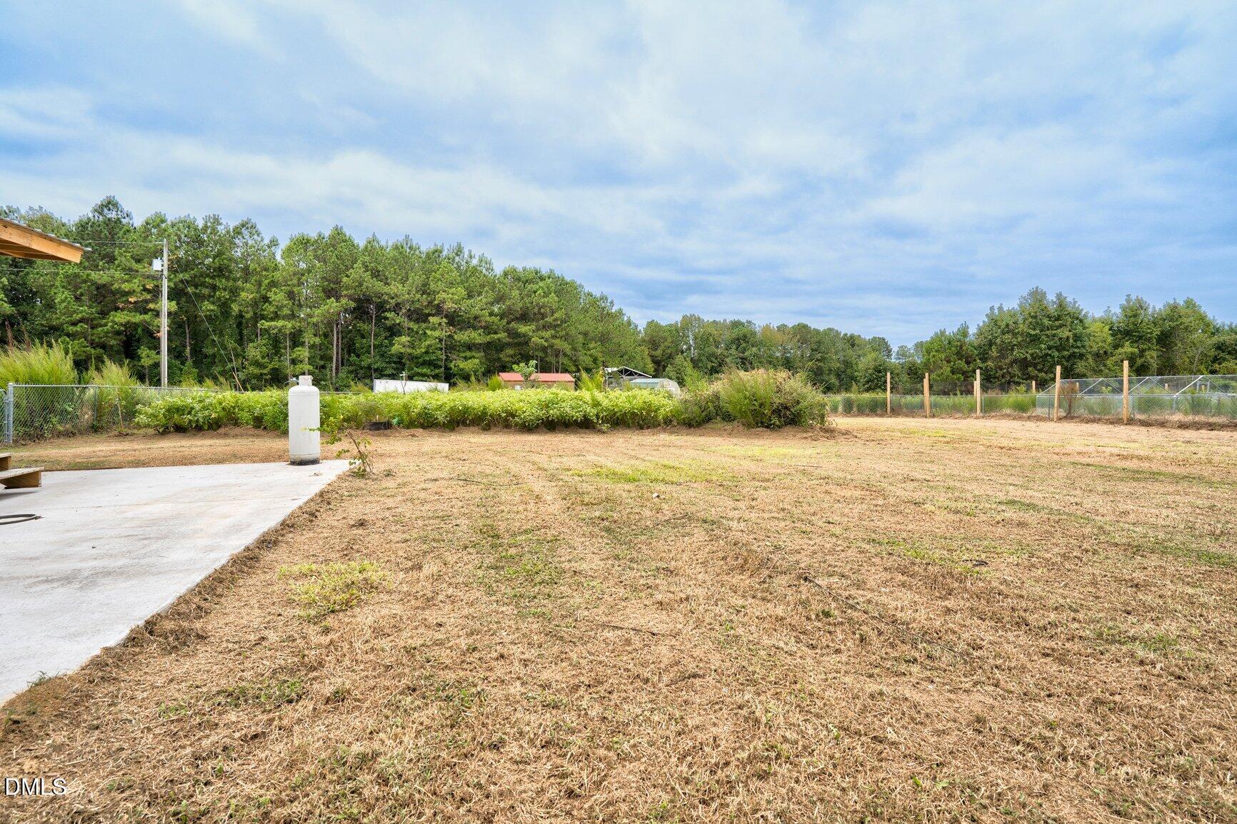 1835 Cokey Road Rocky Mount, NC 27801 - Photo 29 of 42 a view of an outdoor space with yard