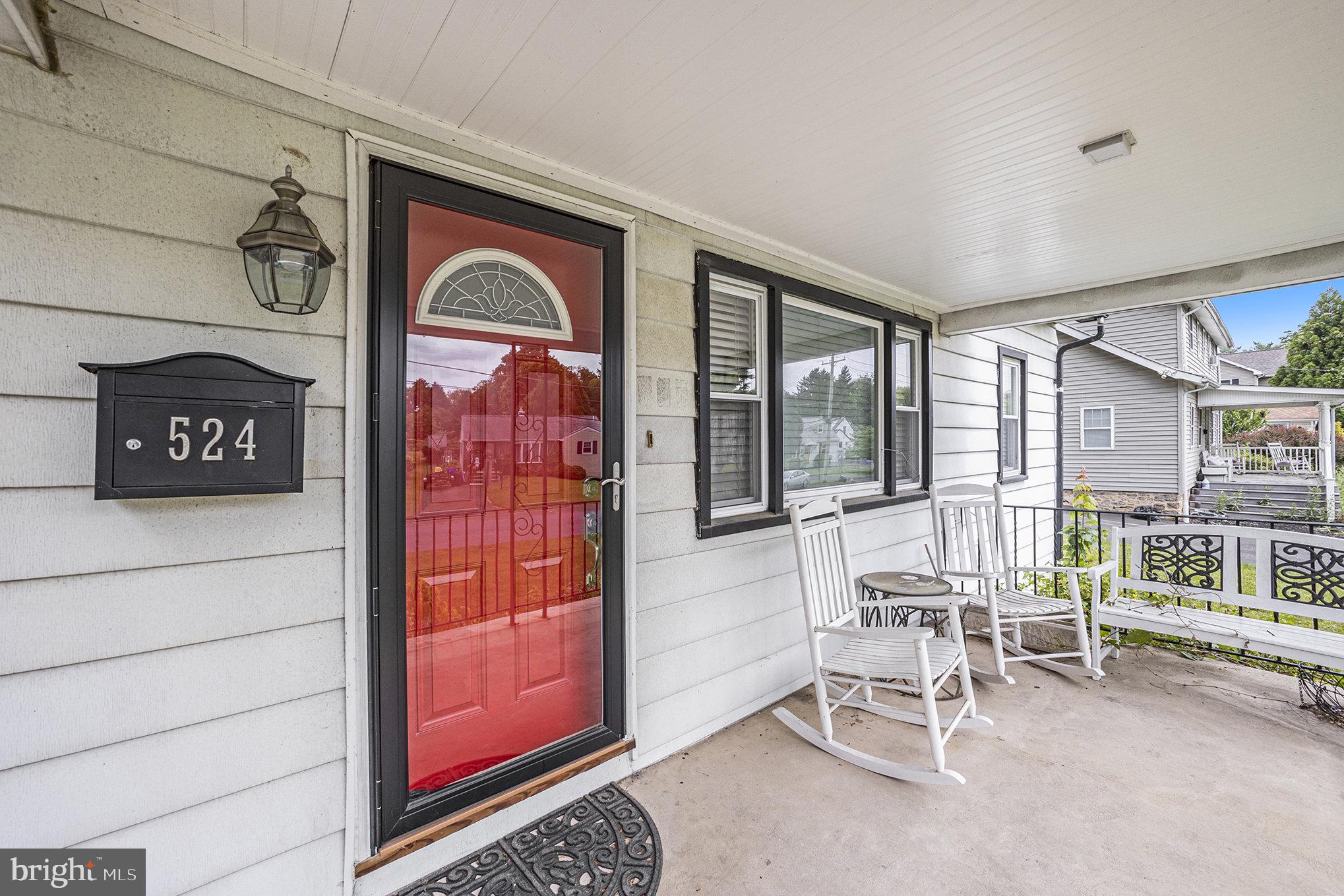 524 Continental Road Hatboro, PA 19040 - Photo 3 of 23 Charming entryway with vibrant red door.