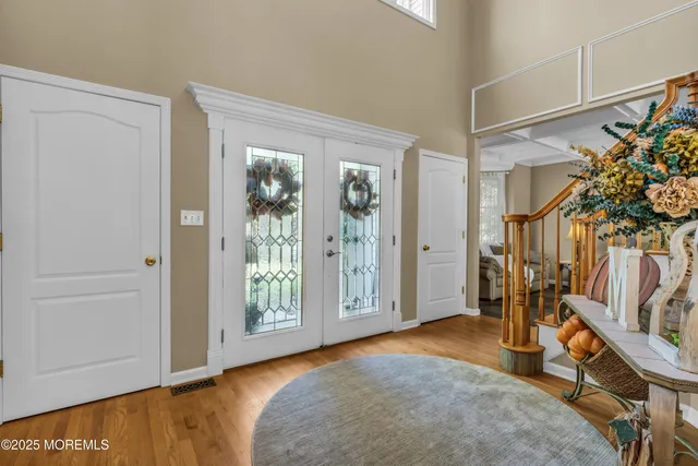a view of an empty room with workspace and window