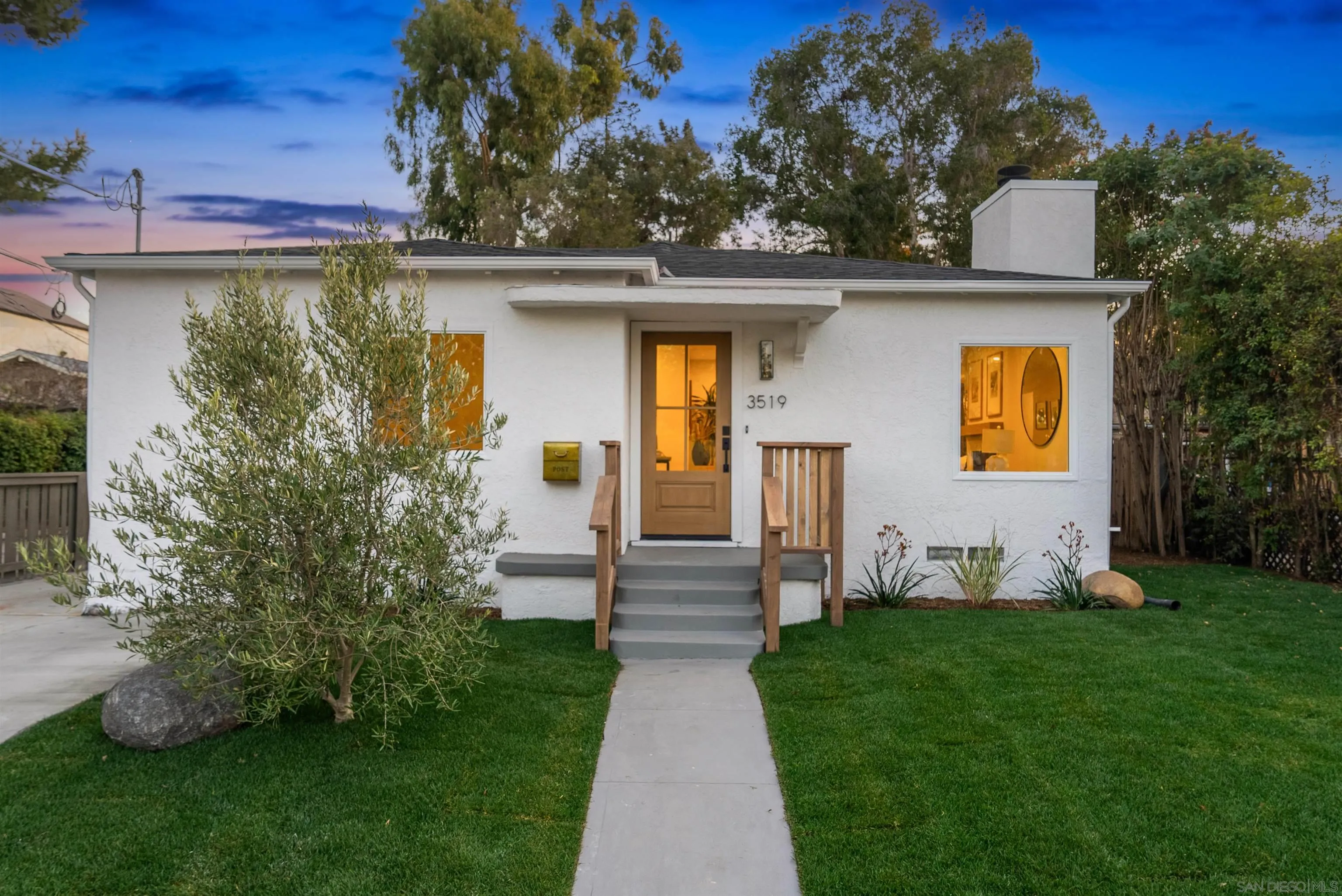 3519 Eugene Place San Diego, CA 92116 - Photo 1 of 1 a front view of a house with garden