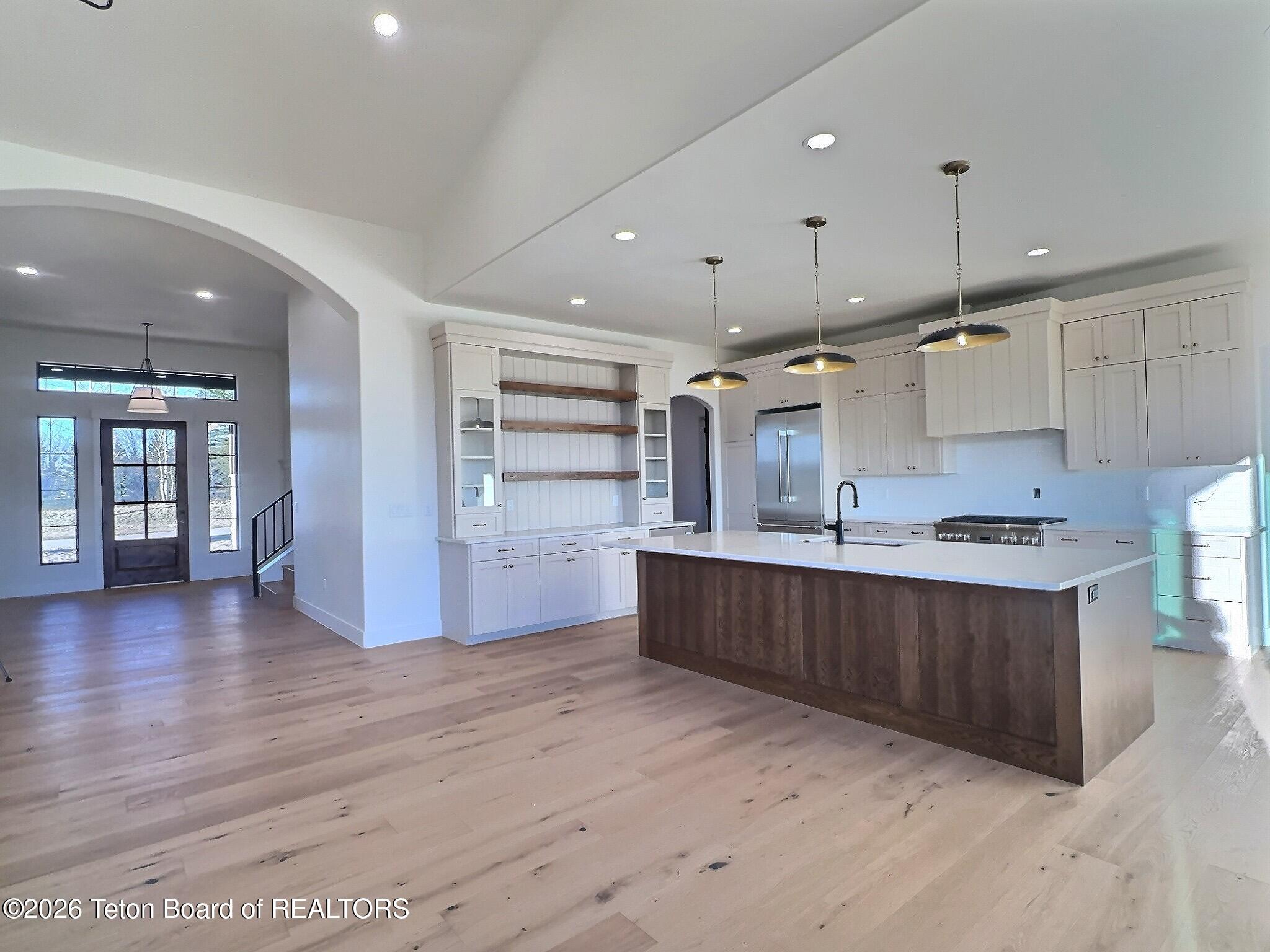371 Desert Fox Lane Victor, ID 83455 - Photo 14 of 46 entry and kitchen from living